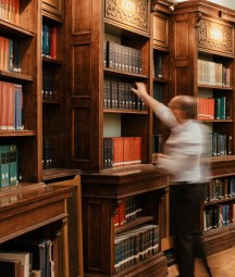 person searching shelves