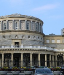 The main building of National Library of Ireland with blue sky.