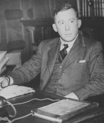 Richard Hayes sitting at his desk