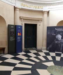 image of large space with black and white floor tiles and heaney signage 