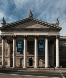 A photograph of the front of the building from Westmoreland Street showing the front columns and the entrance door.