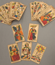 An artistically spread-out French tarot deck belonging to WB Yeats