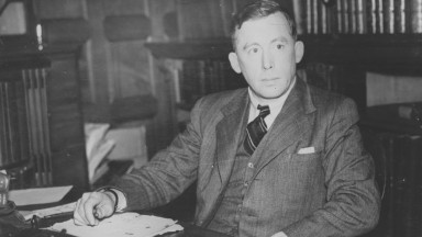 Richard Hayes sitting at his desk