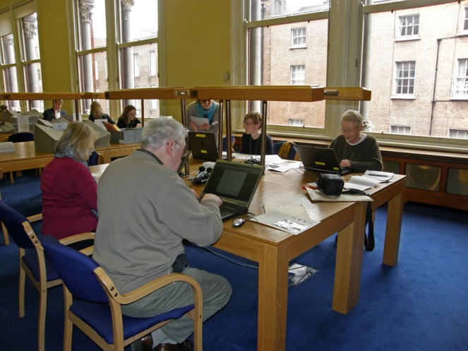 Our wonderful volunteers hard at work. From left (sitting): Mary Holian, Paddy Daly, Leeann Quinn, Betty Quinn. And that is Aoife O'Connell in the middle, trying to hide behind Leeann's laptop. Aoife (who wrote last week's blog post about our Lawrence Photographic Collection) is managing the whole project, and mentoring all of the volunteers.