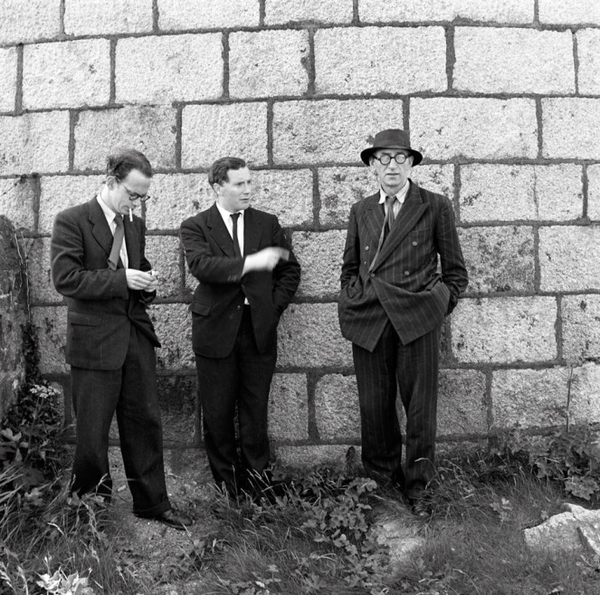 Celebrating the first ever Bloomsday on Wednesday, 16th June 1954 - Anthony Cronin, John Ryan and Patrick Kavanagh at the Martello Tower, Sandycove, Dublin. NLI ref.: WIL pk 11(9)