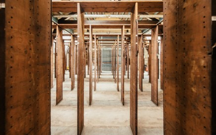 An room of empty book stack brackets