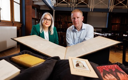 photo of people with book